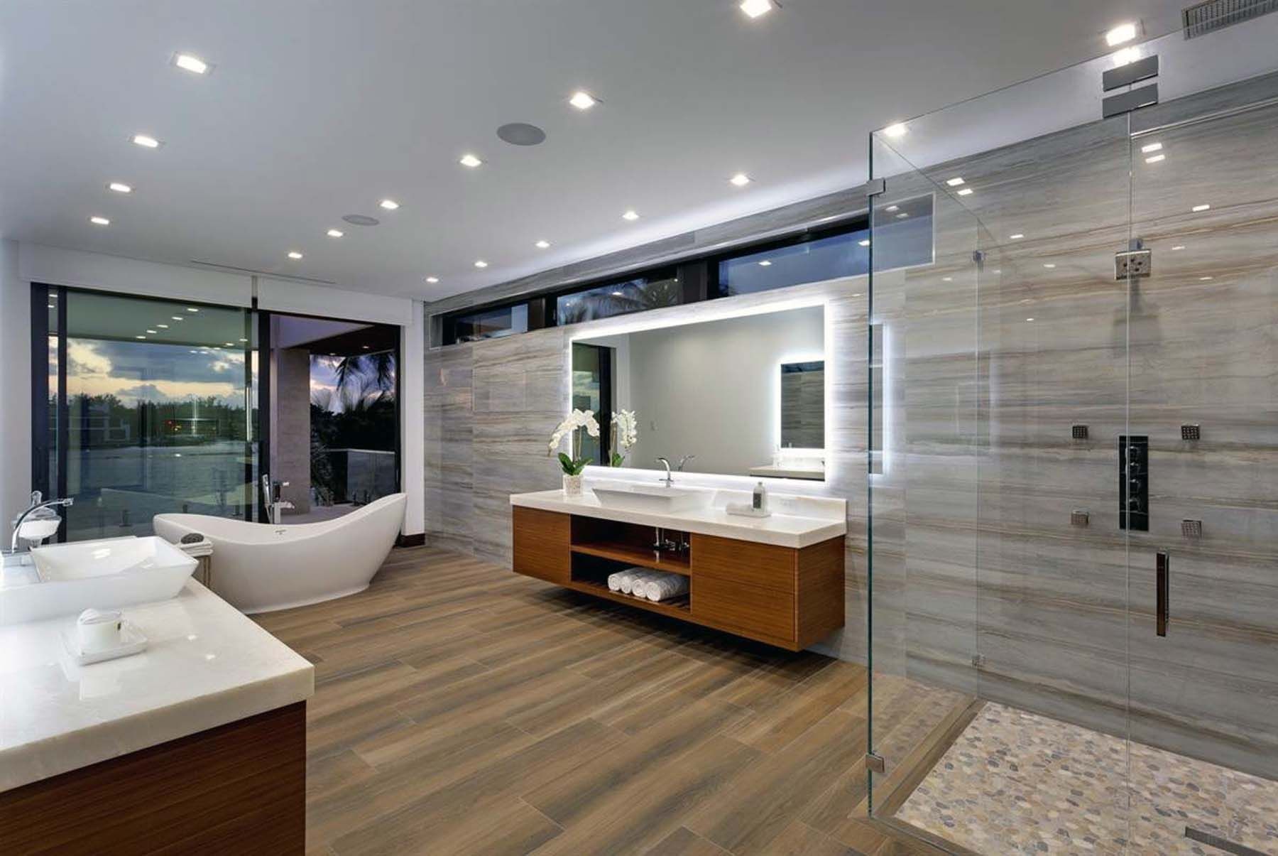 Elegant modern bathroom with clean tiles, custom vanity, and stylish fixtures