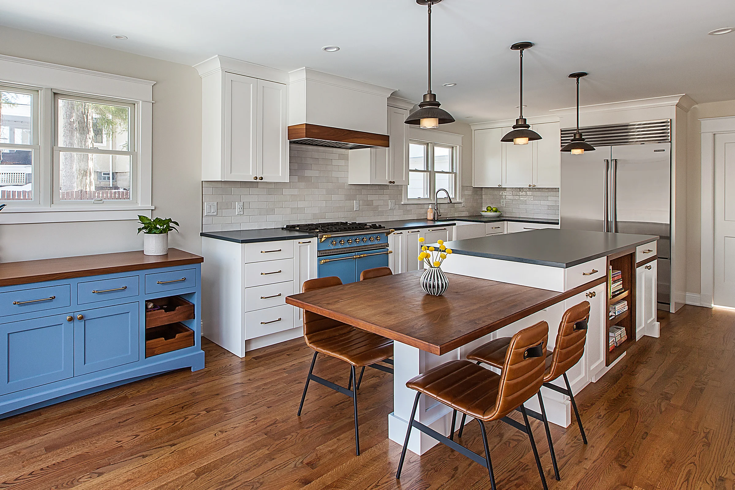Elegant modern kitchen with custom cabinetry, premium countertops, and sleek finishes