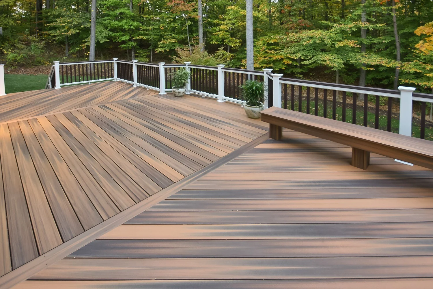 Composite decking boards installed with clean lines and integrated bench seating
