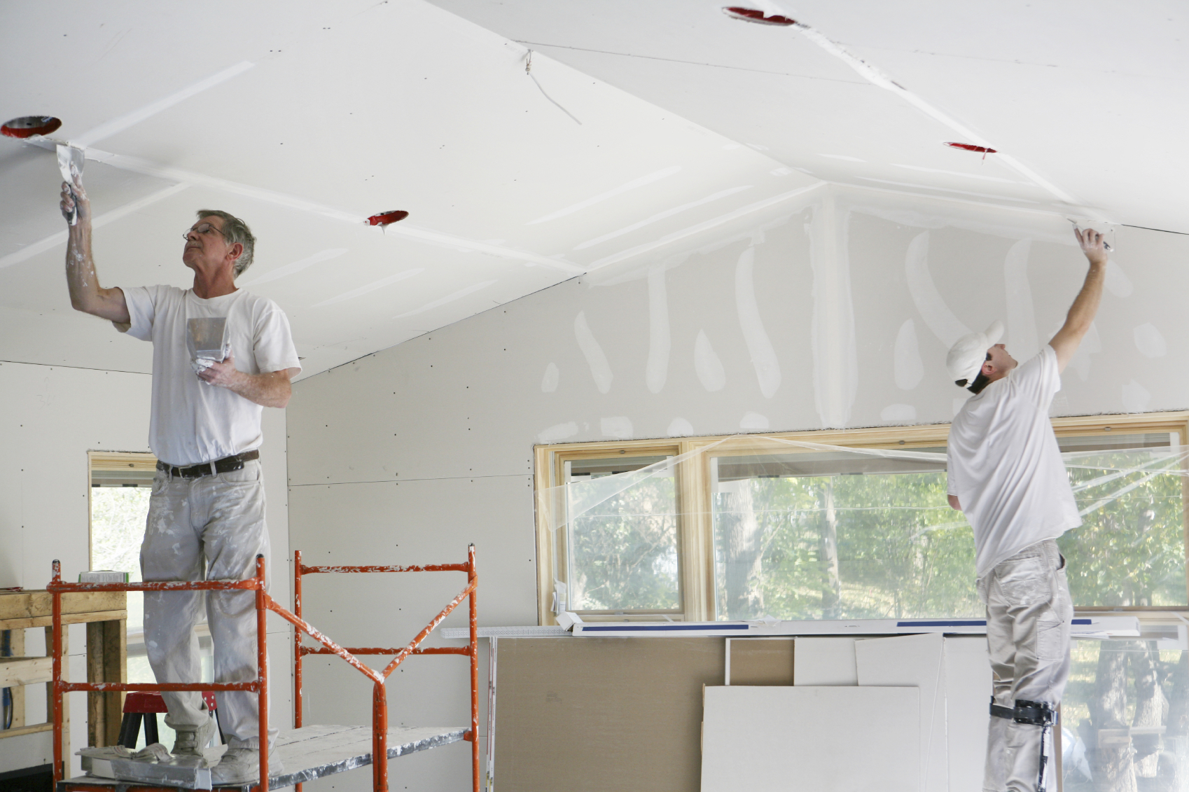Interior room with newly hung drywall ready for taping and finishing